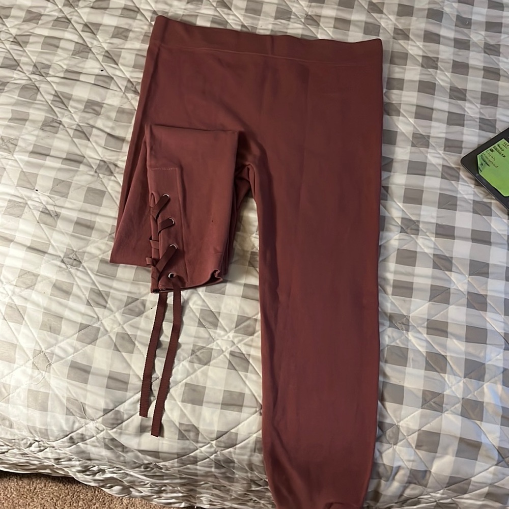 Never worn leggings with tie bottoms